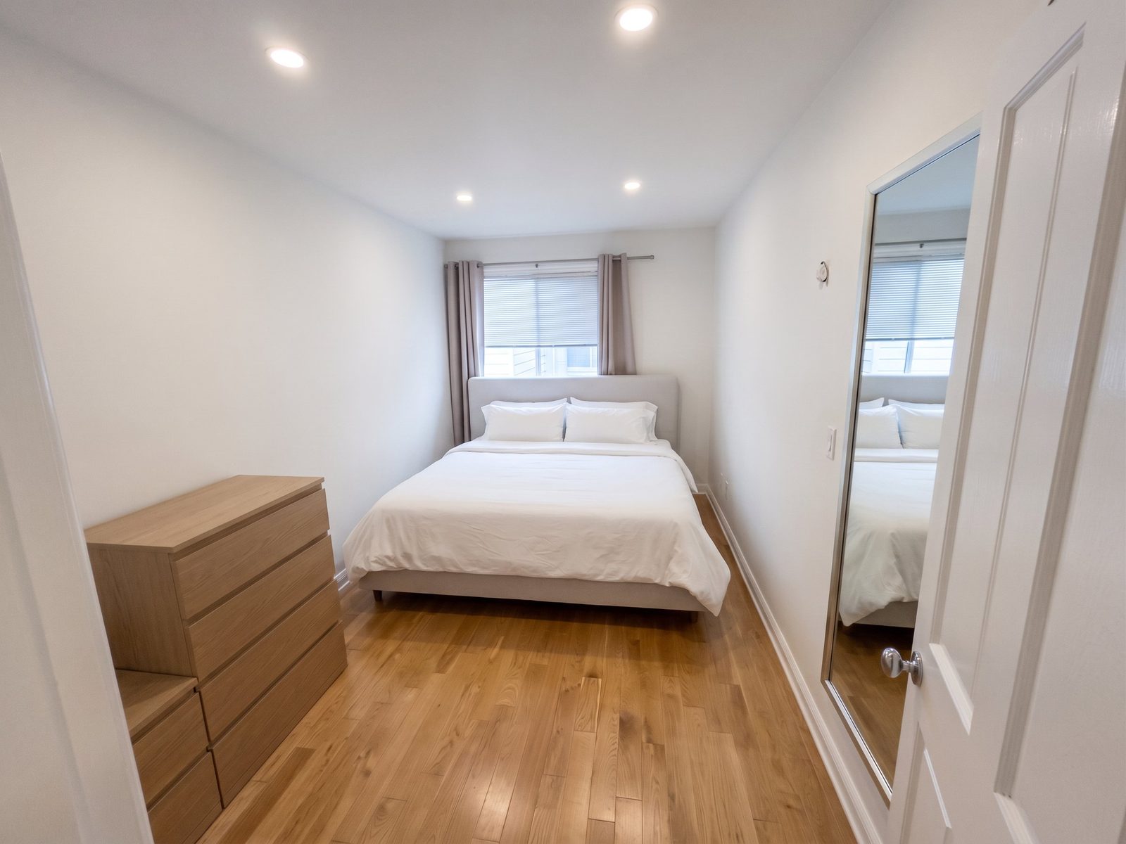 The same bedroom, professionally relit and staged