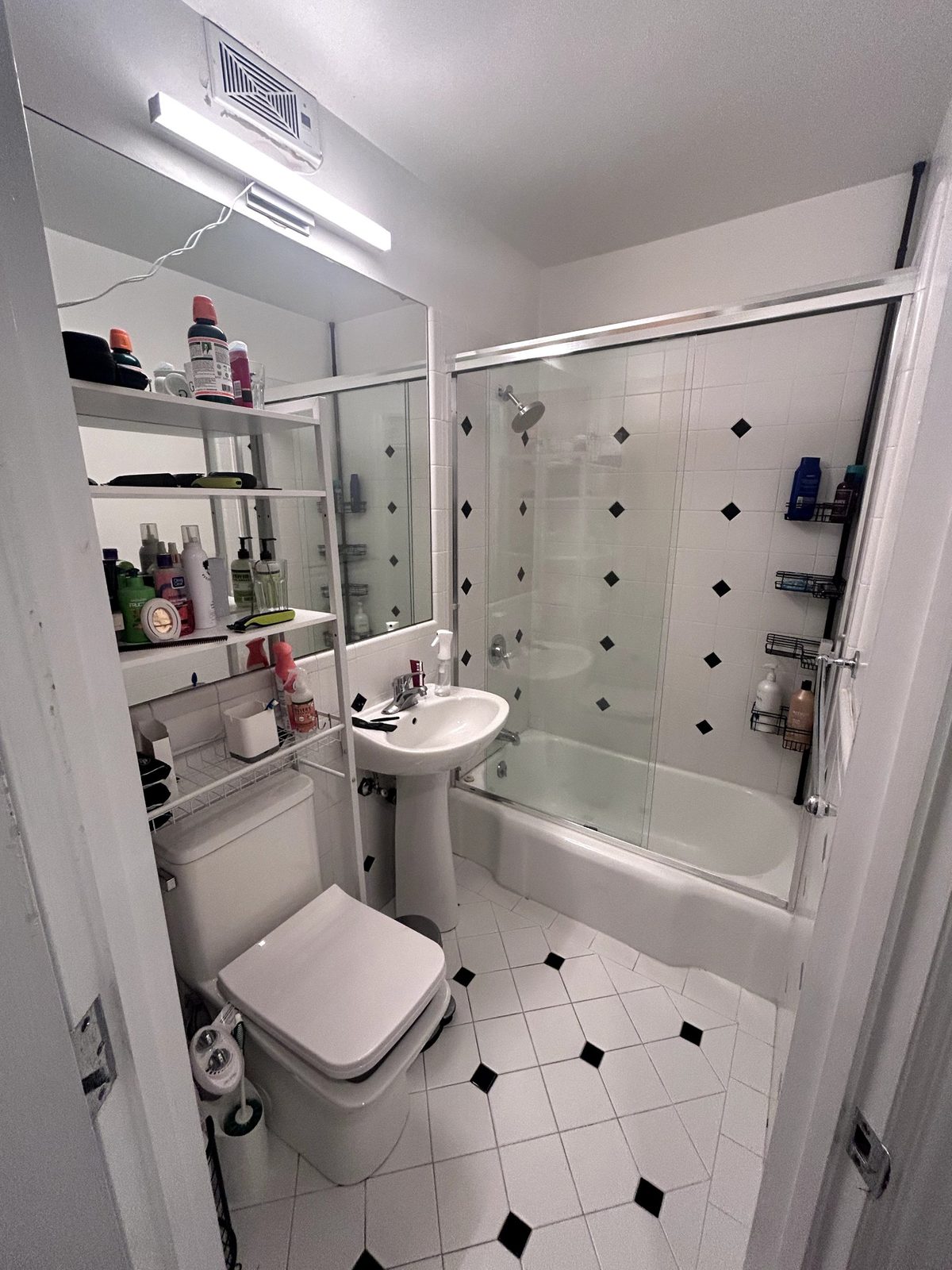 Dim cluttered bathroom